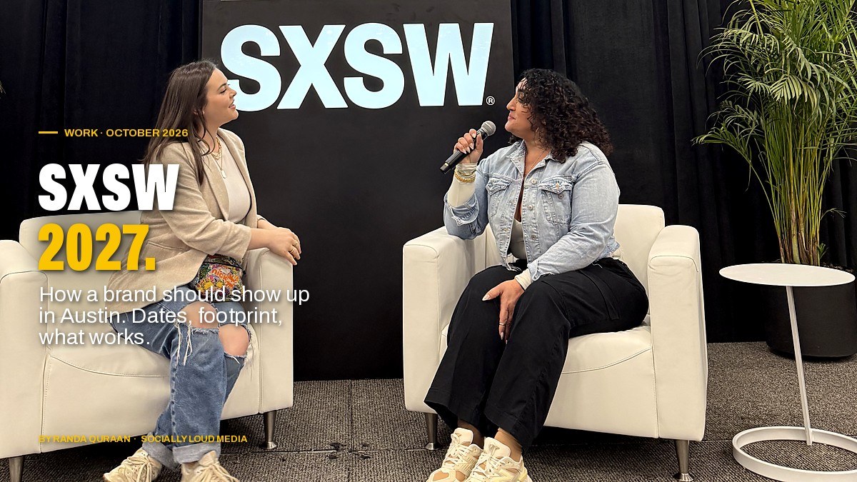 Randa Quraan on a panel at SXSW, seated with a microphone in front of the SXSW arrow