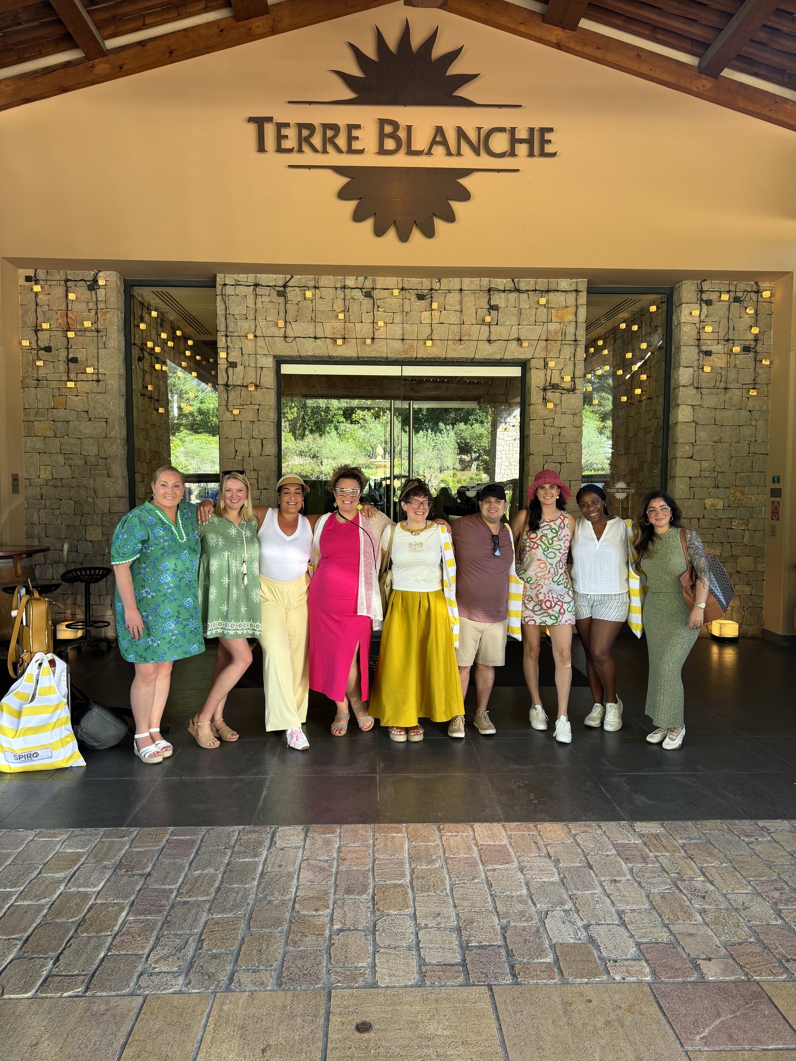 Randa Quraan with the Club Ichi group at the entrance of Terre Blanche, Provence