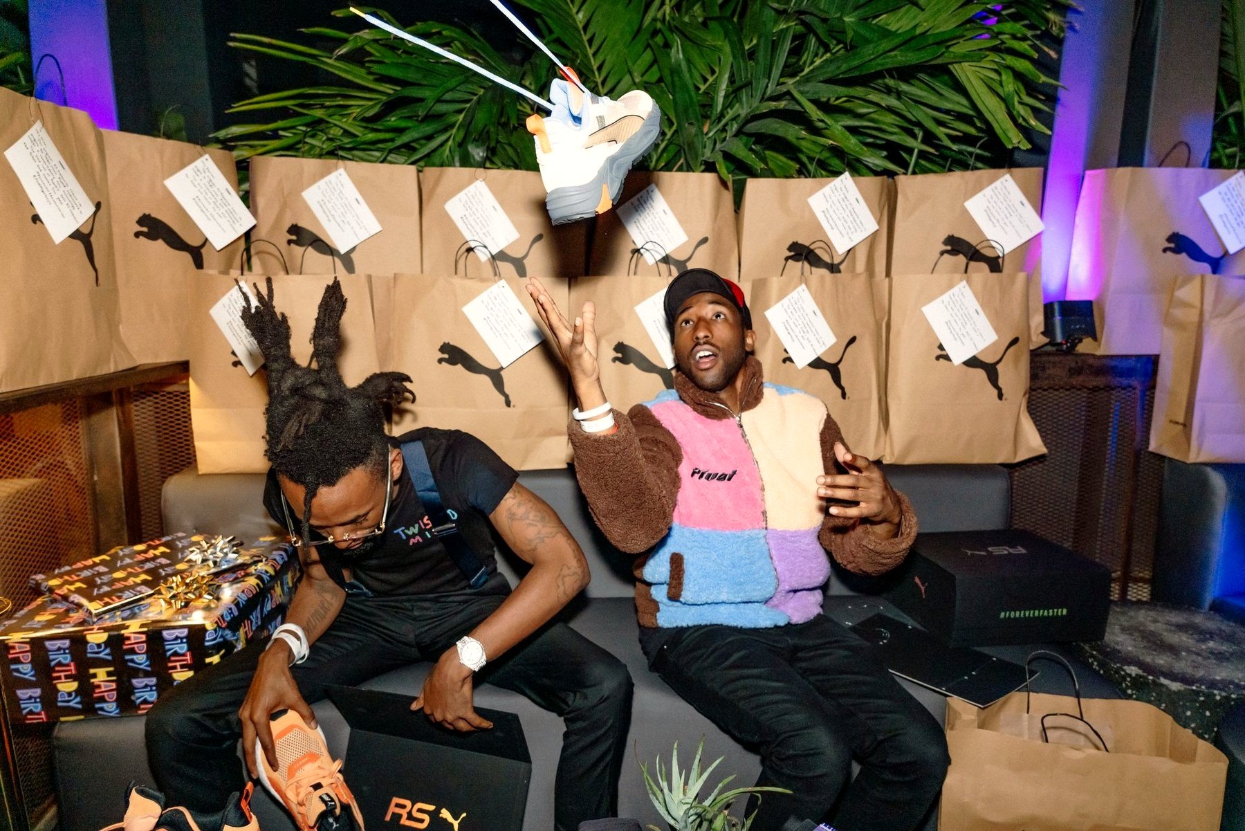 Creators with PUMA RS boxes at the Art Basel dinner