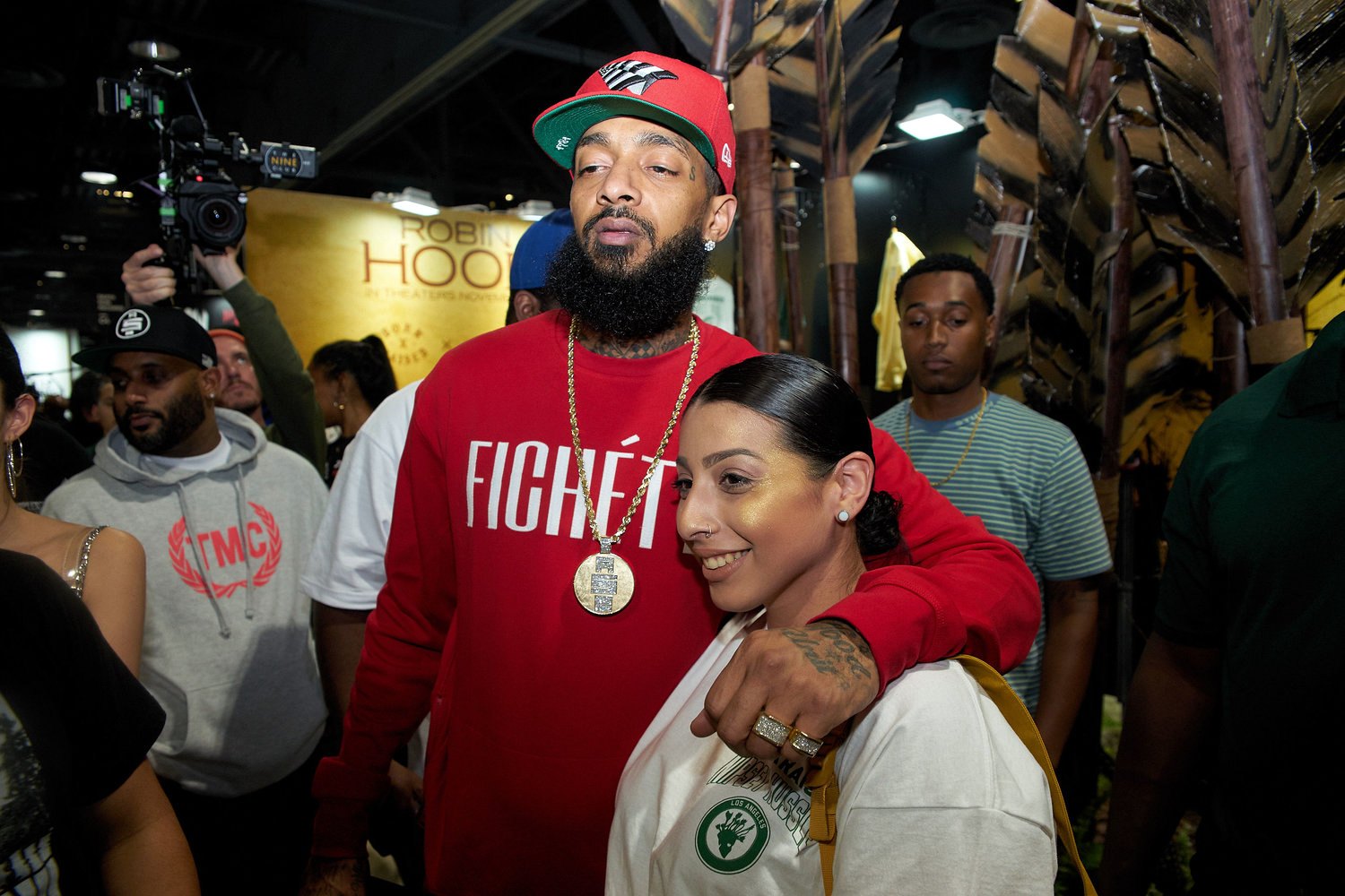 Nipsey Hussle with a fan at the PUMA space at ComplexCon 2017
