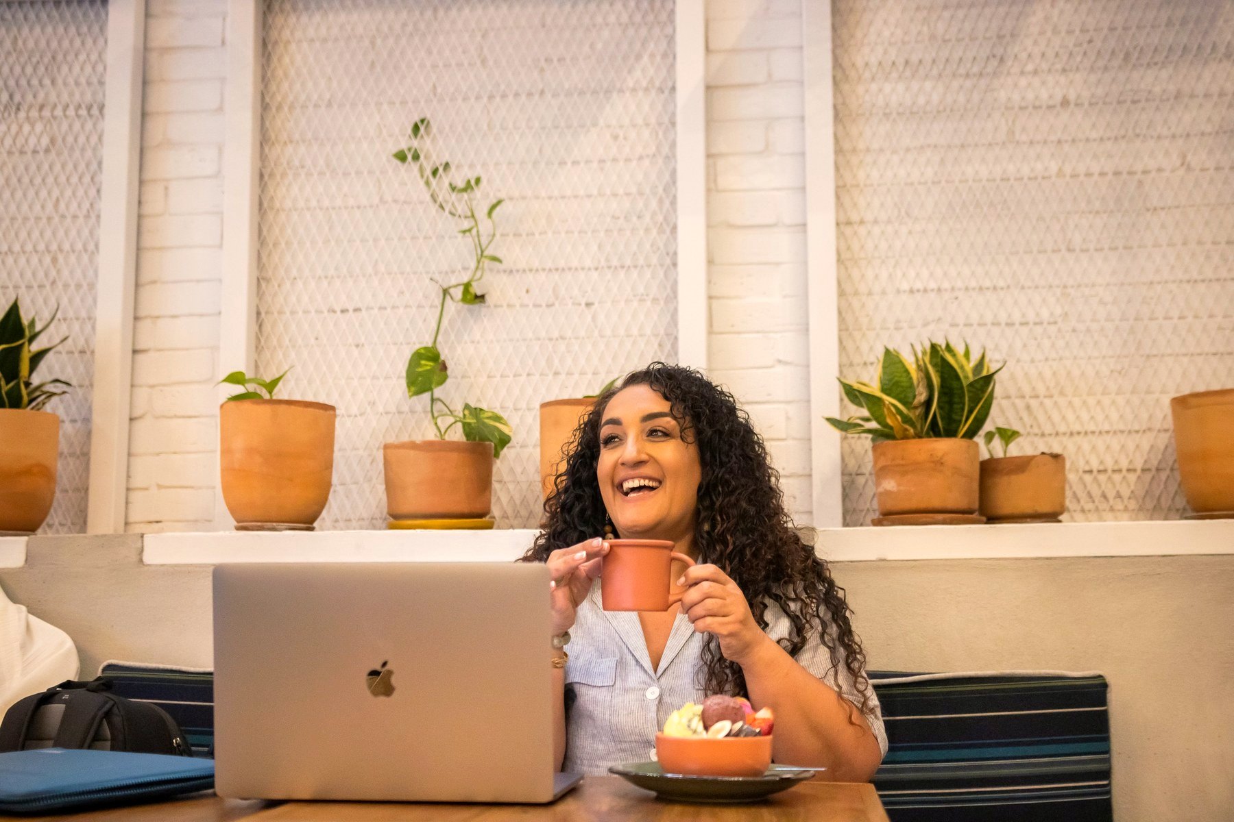 Randa Quraan working at her desk in Miami