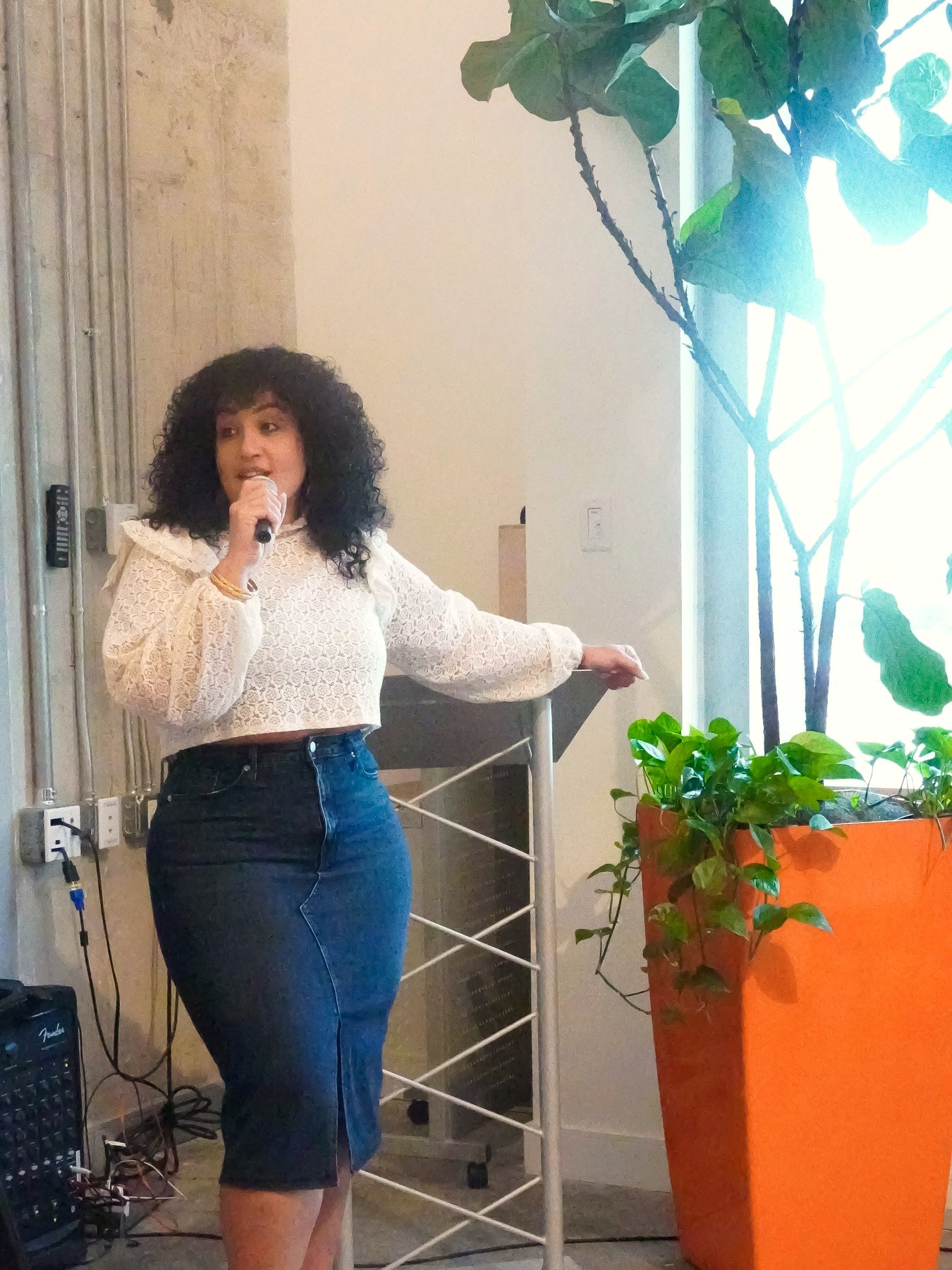 Randa Quraan speaking in the office