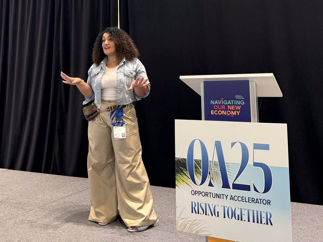 Randa Quraan speaking on stage at Opportunity Accelerator 2025