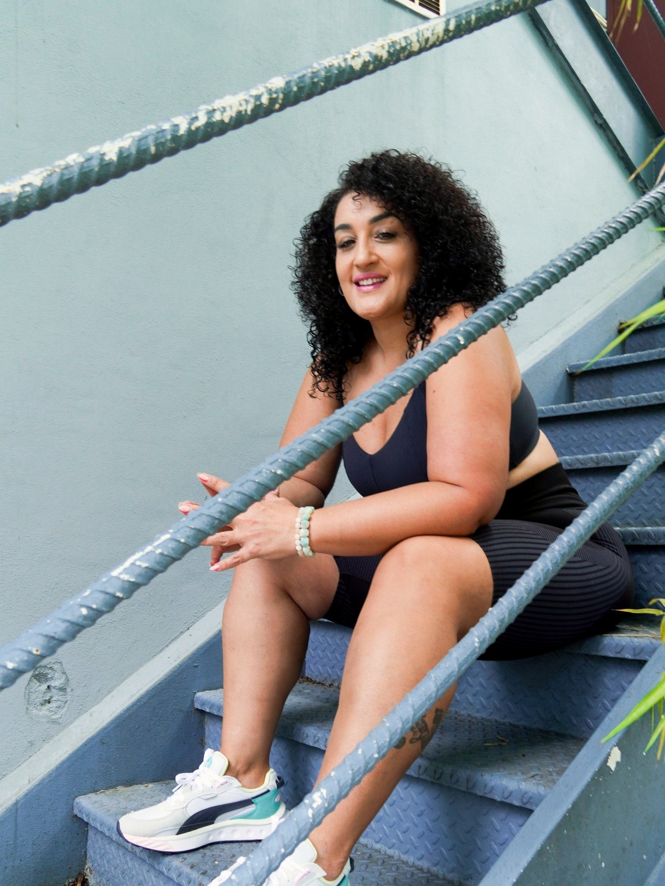 Randa Quraan on the studio stairs